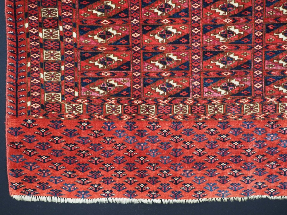 EXCEPTIONAL PAIR OF ANTIQUE TEKKE TURKMEN CHUVAL FACES, SILK HIGHLIGHTS, MID 19TH CENTURY. View X