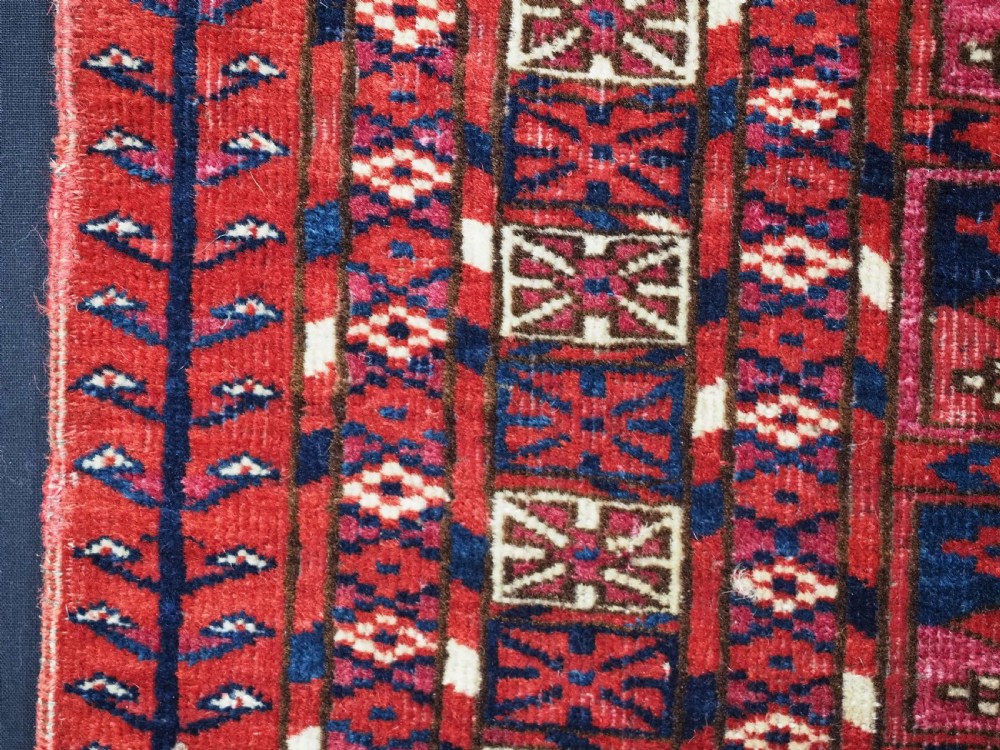 EXCEPTIONAL PAIR OF ANTIQUE TEKKE TURKMEN CHUVAL FACES, SILK HIGHLIGHTS, MID 19TH CENTURY. View XX
