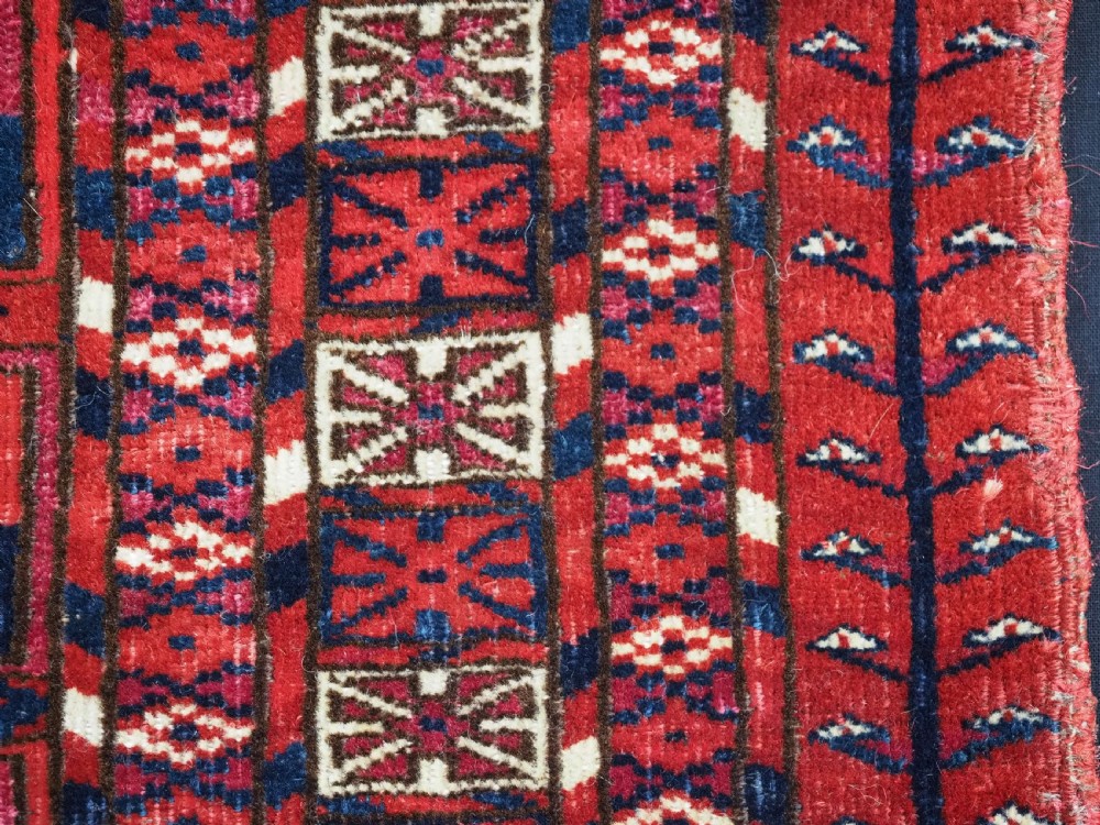 EXCEPTIONAL PAIR OF ANTIQUE TEKKE TURKMEN CHUVAL FACES, SILK HIGHLIGHTS, MID 19TH CENTURY. View XXII