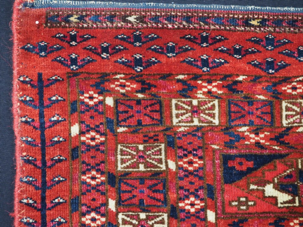 EXCEPTIONAL PAIR OF ANTIQUE TEKKE TURKMEN CHUVAL FACES, SILK HIGHLIGHTS, MID 19TH CENTURY. View XXIII