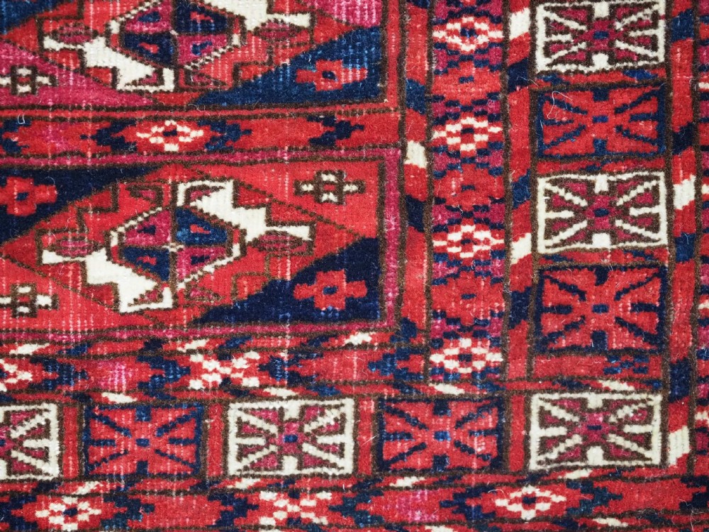 EXCEPTIONAL PAIR OF ANTIQUE TEKKE TURKMEN CHUVAL FACES, SILK HIGHLIGHTS, MID 19TH CENTURY. View XXVIII