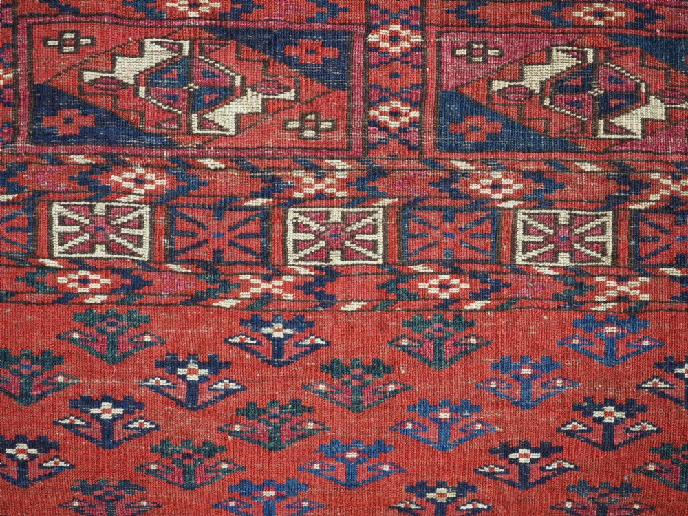 EXCEPTIONAL PAIR OF ANTIQUE TEKKE TURKMEN CHUVAL FACES, SILK HIGHLIGHTS, MID 19TH CENTURY. View XXIX