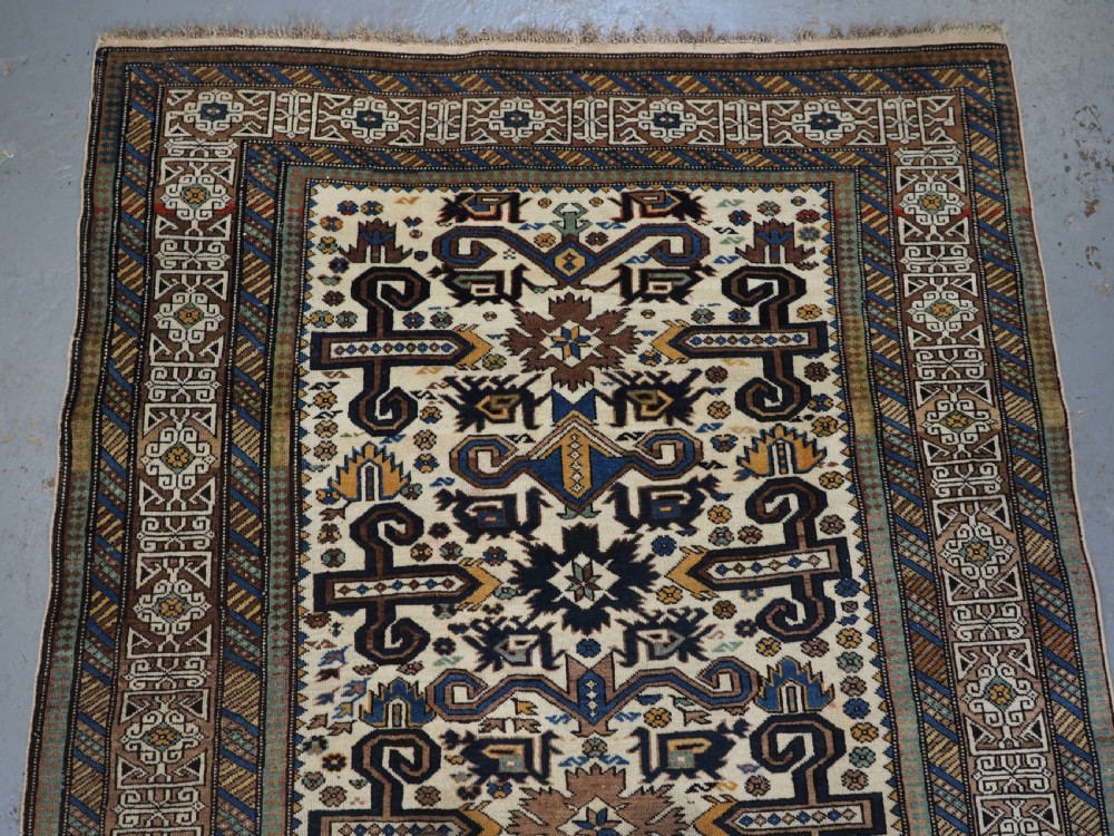 ANTIQUE CAUCASIAN KUBA REGION WHITE GROUND PEREPEDIL RUG, CIRCA 1890. View II