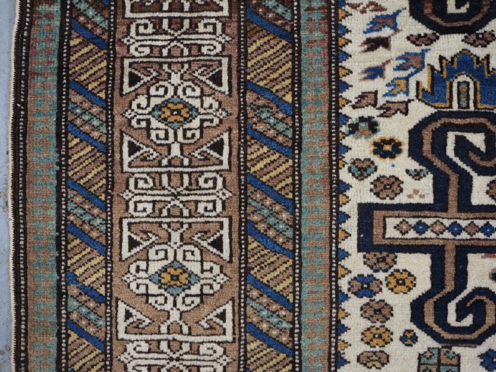 ANTIQUE CAUCASIAN KUBA REGION WHITE GROUND PEREPEDIL RUG, CIRCA 1890. View VII