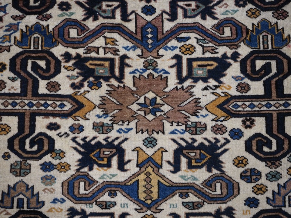 ANTIQUE CAUCASIAN KUBA REGION WHITE GROUND PEREPEDIL RUG, CIRCA 1890. View VIII