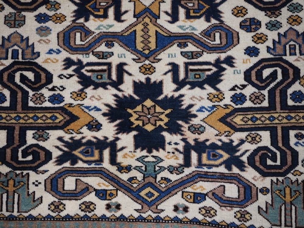 ANTIQUE CAUCASIAN KUBA REGION WHITE GROUND PEREPEDIL RUG, CIRCA 1890. View IX