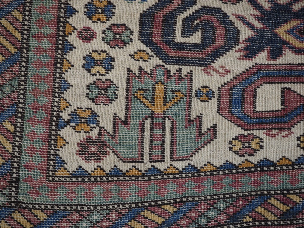 ANTIQUE CAUCASIAN KUBA REGION WHITE GROUND PEREPEDIL RUG, CIRCA 1890. View XI
