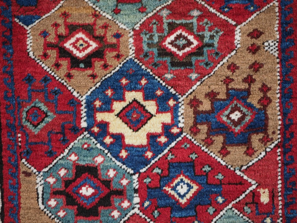 ANTIQUE SHAHSAVAN BAG FACE, PILED WITH SUPERB COLOUR, CIRCA 1890. View VI