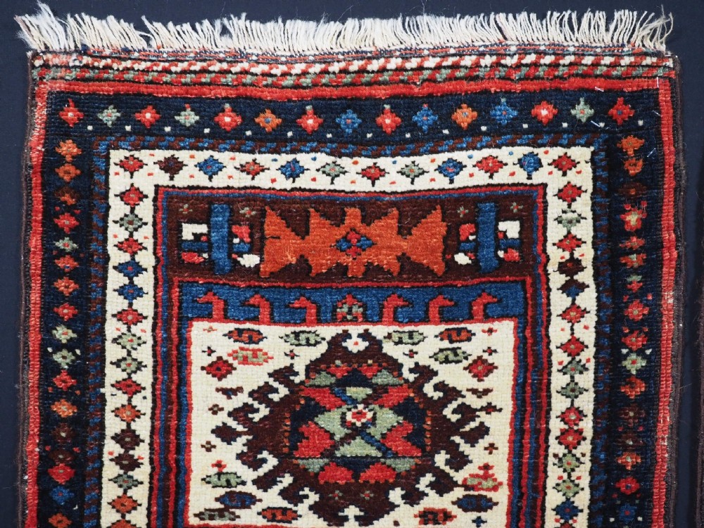 A PAIR OF ANTIQUE KURDISH SADDLE BAG FACES, SUPERB CONDITION, CIRCA 1900. View IV