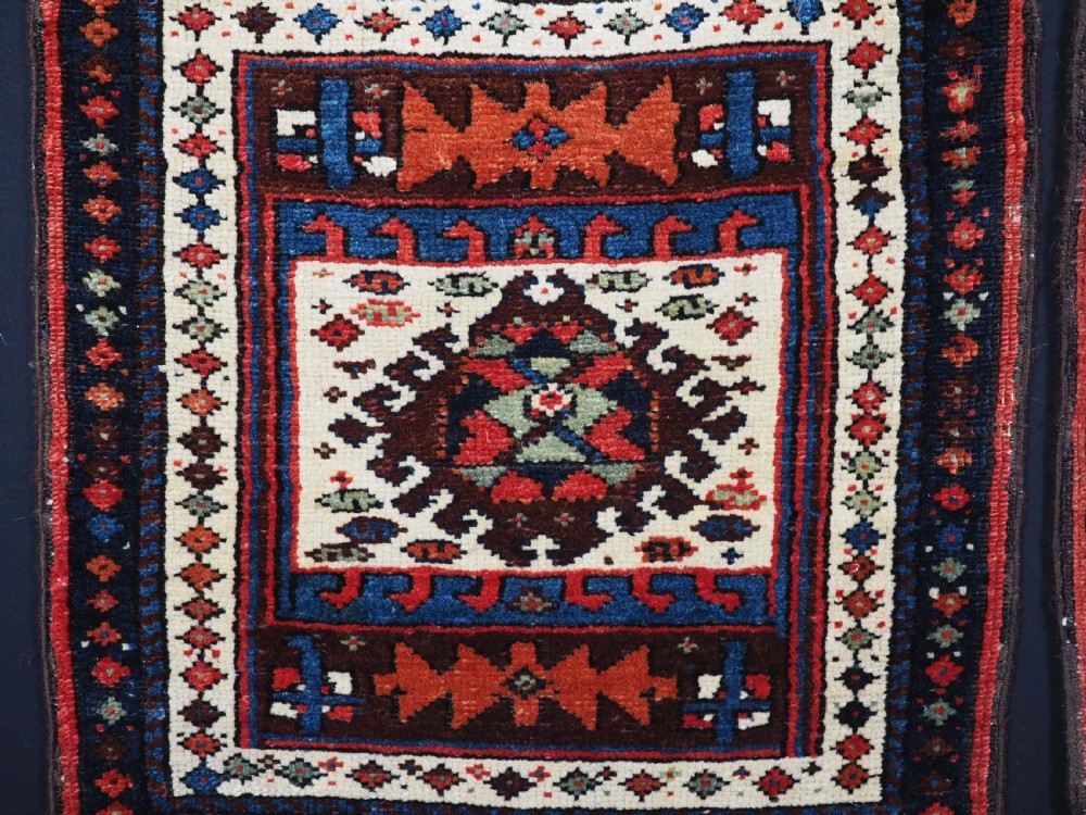 A PAIR OF ANTIQUE KURDISH SADDLE BAG FACES, SUPERB CONDITION, CIRCA 1900. View V
