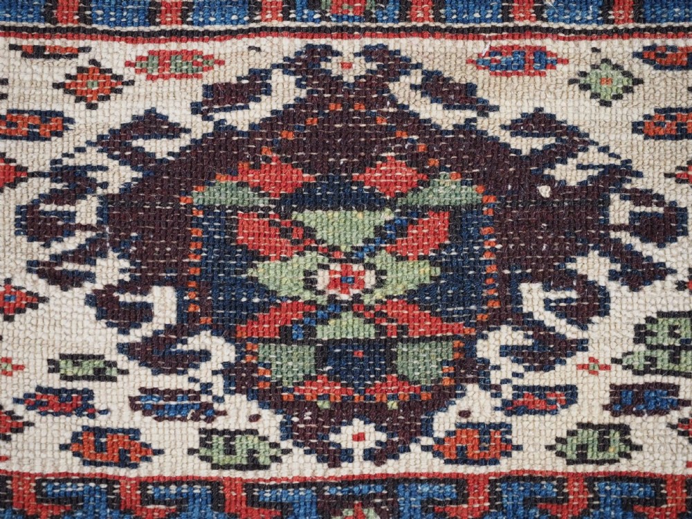 A PAIR OF ANTIQUE KURDISH SADDLE BAG FACES, SUPERB CONDITION, CIRCA 1900. View XII