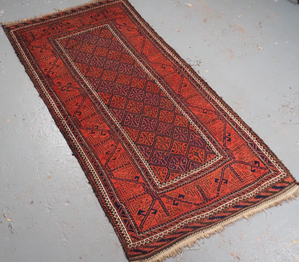 ANTIQUE AFGHAN BALUCH RUG WITH LATTICE DESIGN, CIRCA 1900. View II