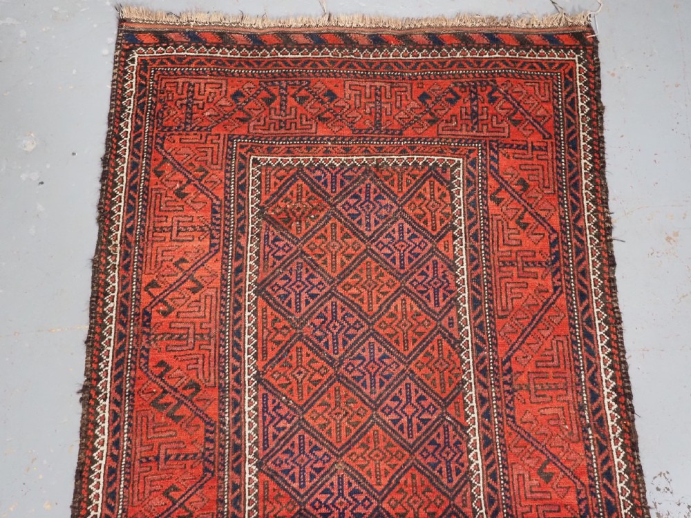 ANTIQUE AFGHAN BALUCH RUG WITH LATTICE DESIGN, CIRCA 1900. View III