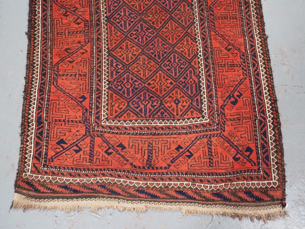 ANTIQUE AFGHAN BALUCH RUG WITH LATTICE DESIGN, CIRCA 1900. View V
