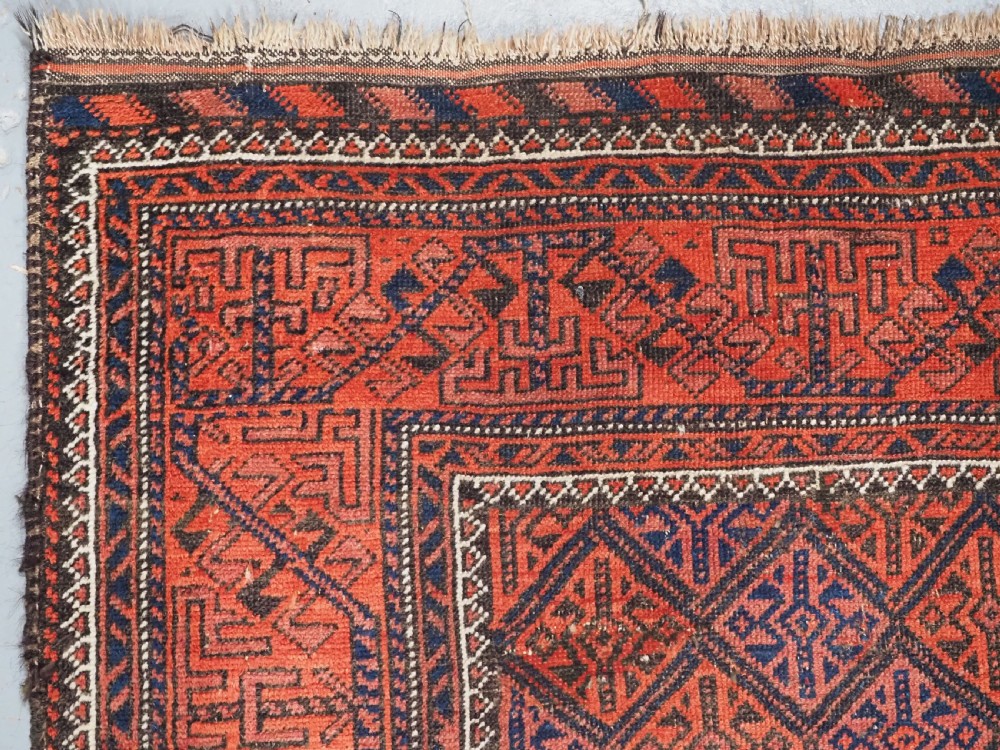 ANTIQUE AFGHAN BALUCH RUG WITH LATTICE DESIGN, CIRCA 1900. View VI