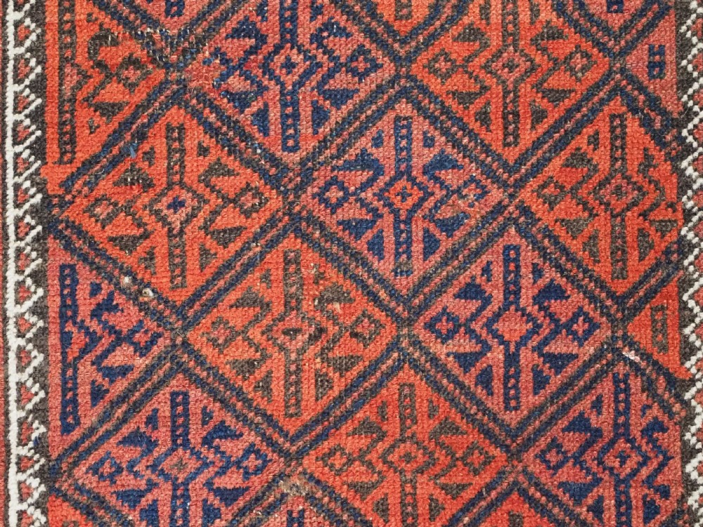 ANTIQUE AFGHAN BALUCH RUG WITH LATTICE DESIGN, CIRCA 1900. View VII