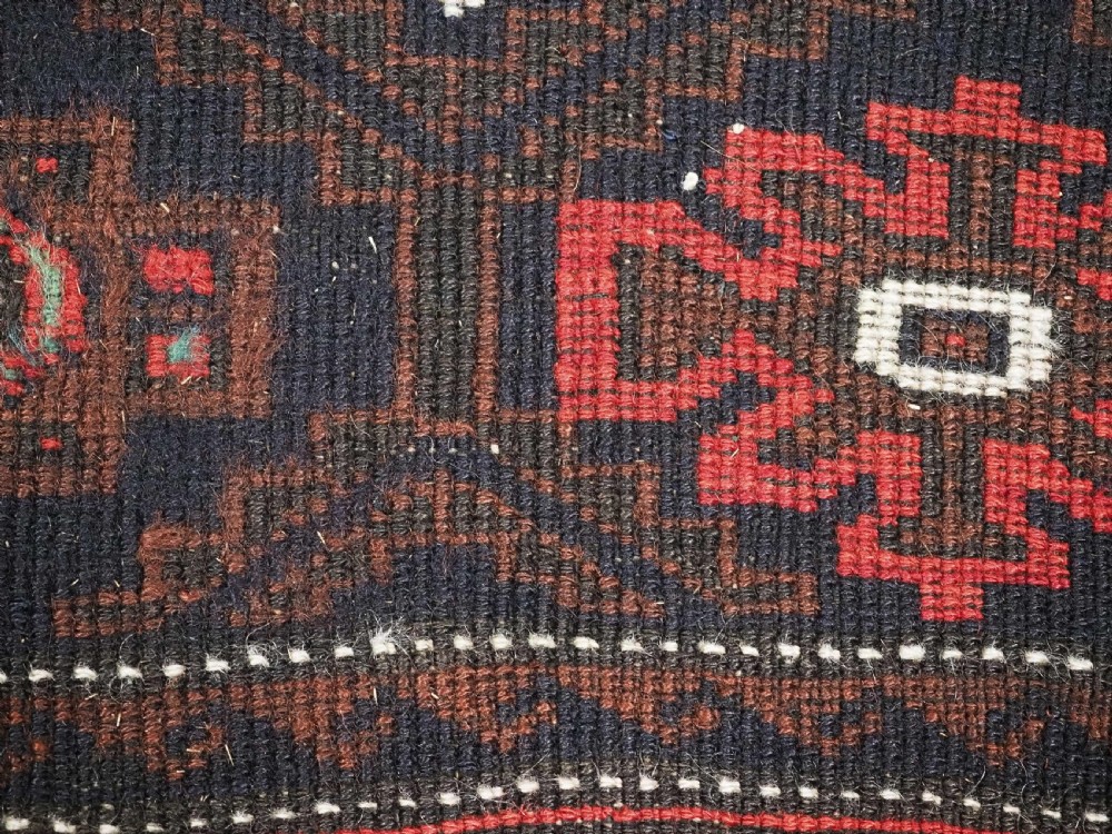 ANTIQUE BALUCH SADDLE BAG FACE WITH SNOWFLAKE DESIGN, CIRCA 1900. View VIII