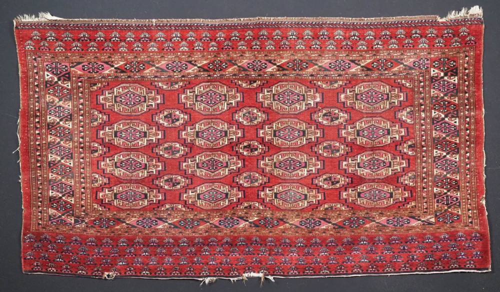 ANTIQUE SARYK TURKMEN CHUVAL FACE, COTTON AND COCHINEAL HIGHLIGHTS, 2ND HALF 19TH CENT.