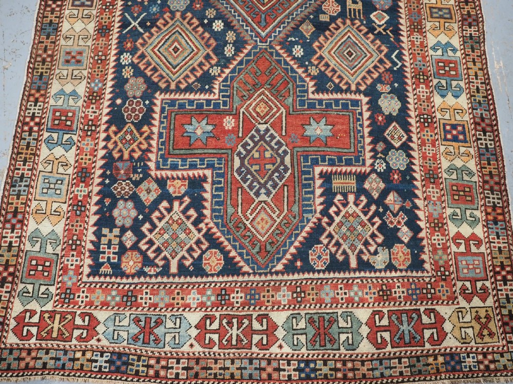 ANTIQUE CAUCASIAN AKSTAFA RUG WITH BOLD MEDALLION DESIGN, CIRCA 1890. View V