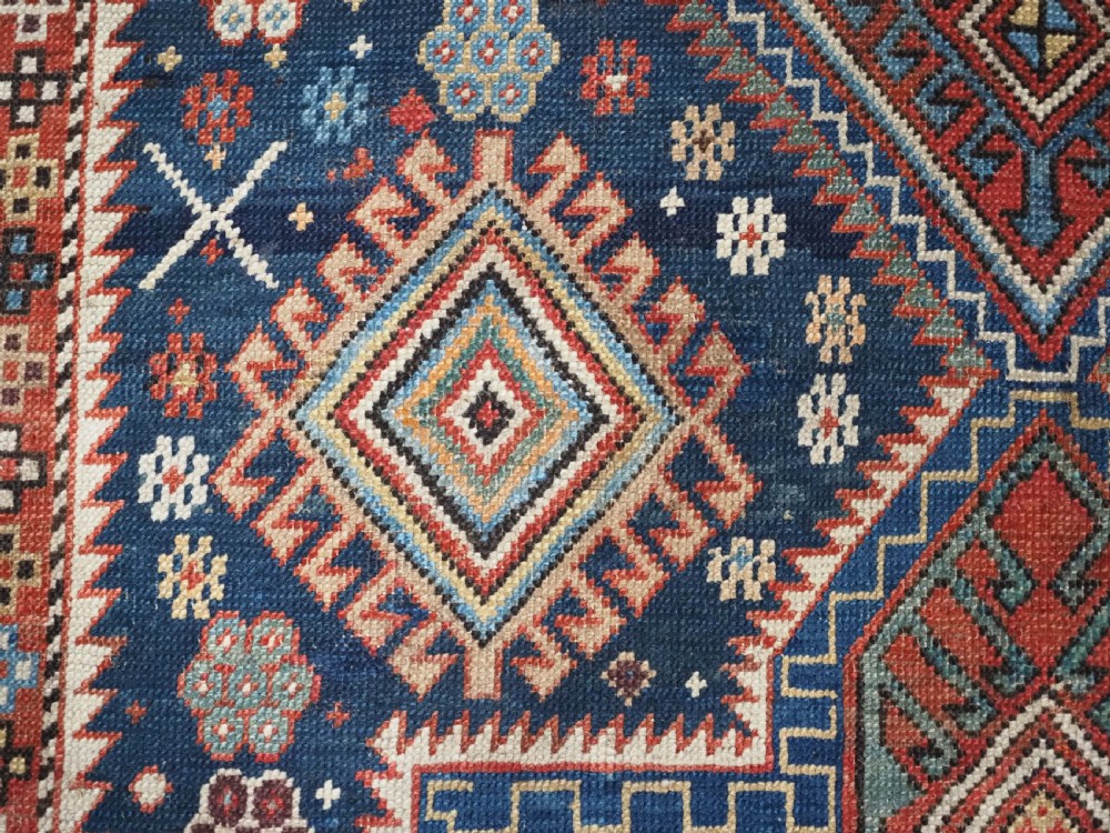 ANTIQUE CAUCASIAN AKSTAFA RUG WITH BOLD MEDALLION DESIGN, CIRCA 1890. View VIII