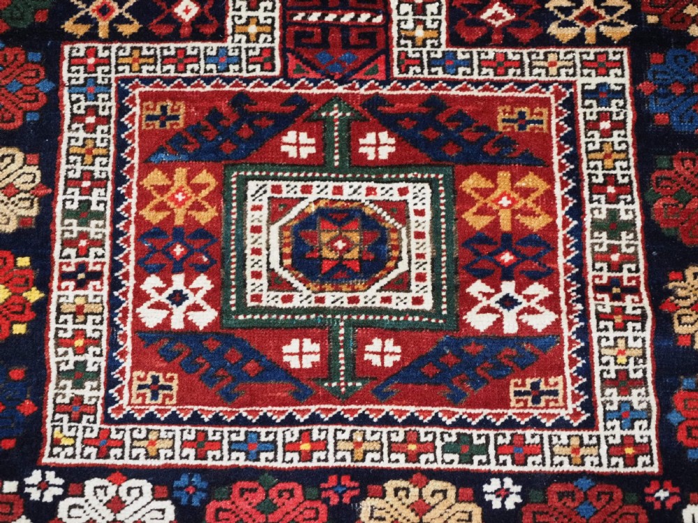 ANTIQUE CAUCASIAN SHIRVAN RUG WITH COMPARTMENT DESIGN, BAKU REGION, CIRCA 1900. View X