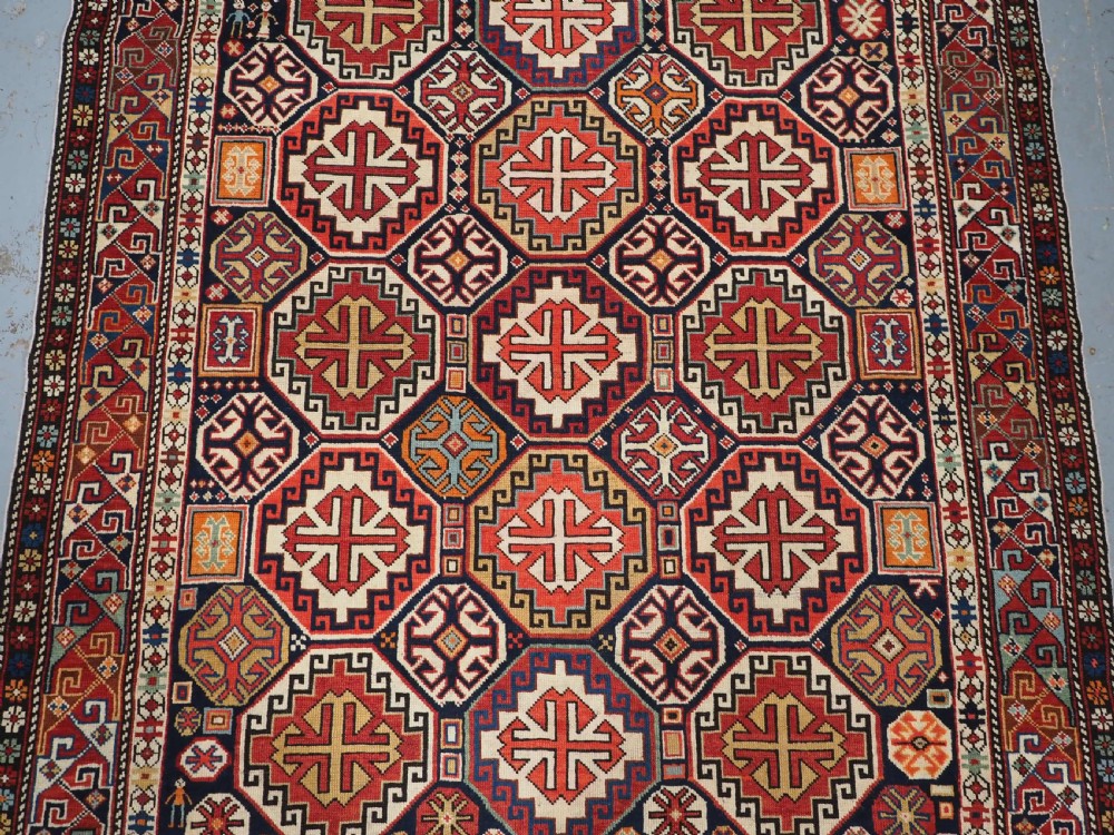 ANTIQUE CAUCASIAN SHIRVAN RUG WITH OCTAGON LATTICE DESIGN, CIRCA 1890. View IV