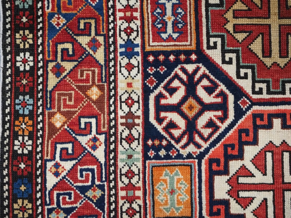 ANTIQUE CAUCASIAN SHIRVAN RUG WITH OCTAGON LATTICE DESIGN, CIRCA 1890. View VI