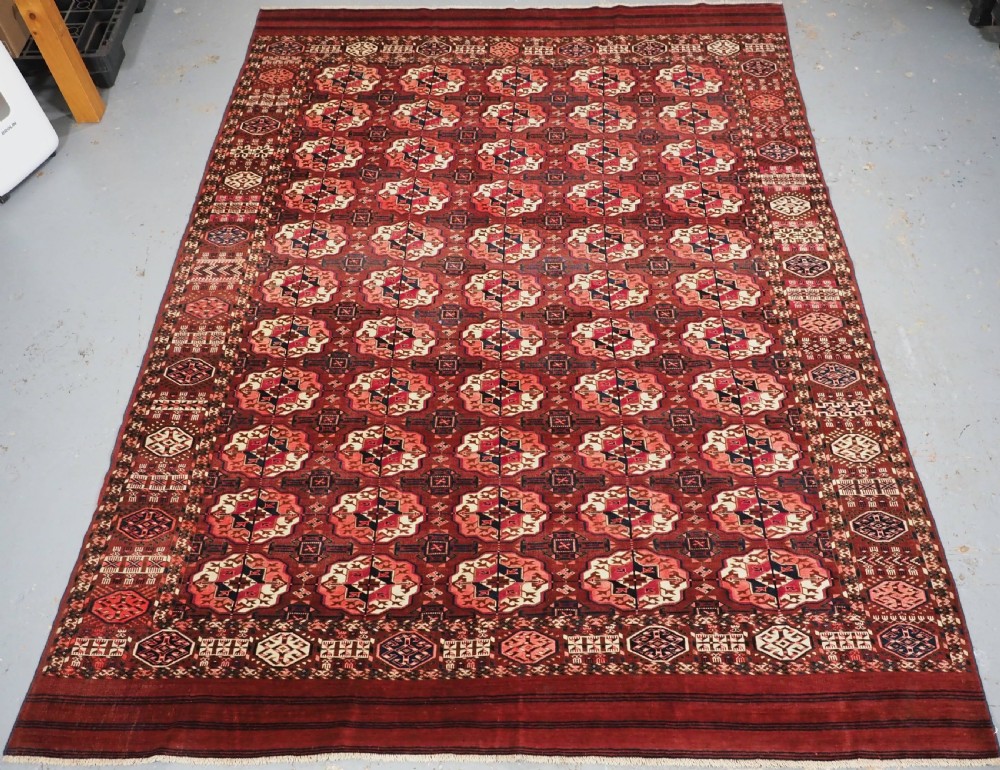 ANTIQUE TEKKE TURKMEN MAIN CARPET, SMALL ROOM SIZE, CIRCA 1880.