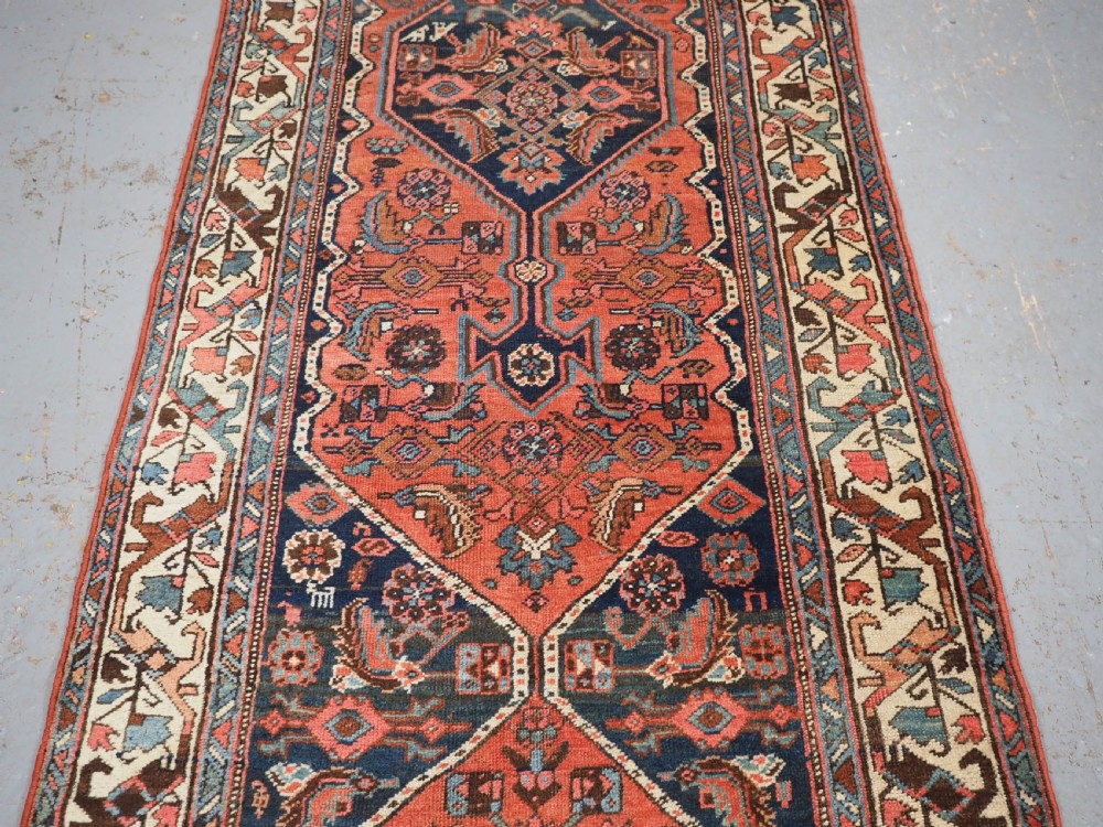 ANTIQUE BIJAR RUNNER WITH LINKED MEDALLION DESIGN, CIRCA 1890. View IV