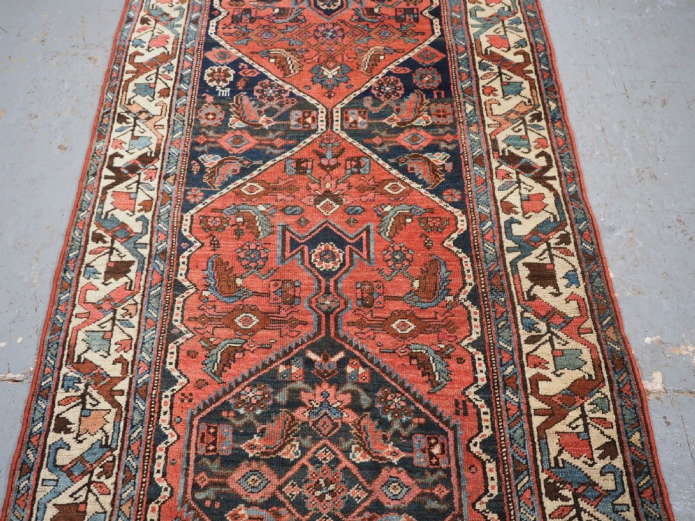 ANTIQUE BIJAR RUNNER WITH LINKED MEDALLION DESIGN, CIRCA 1890. View V