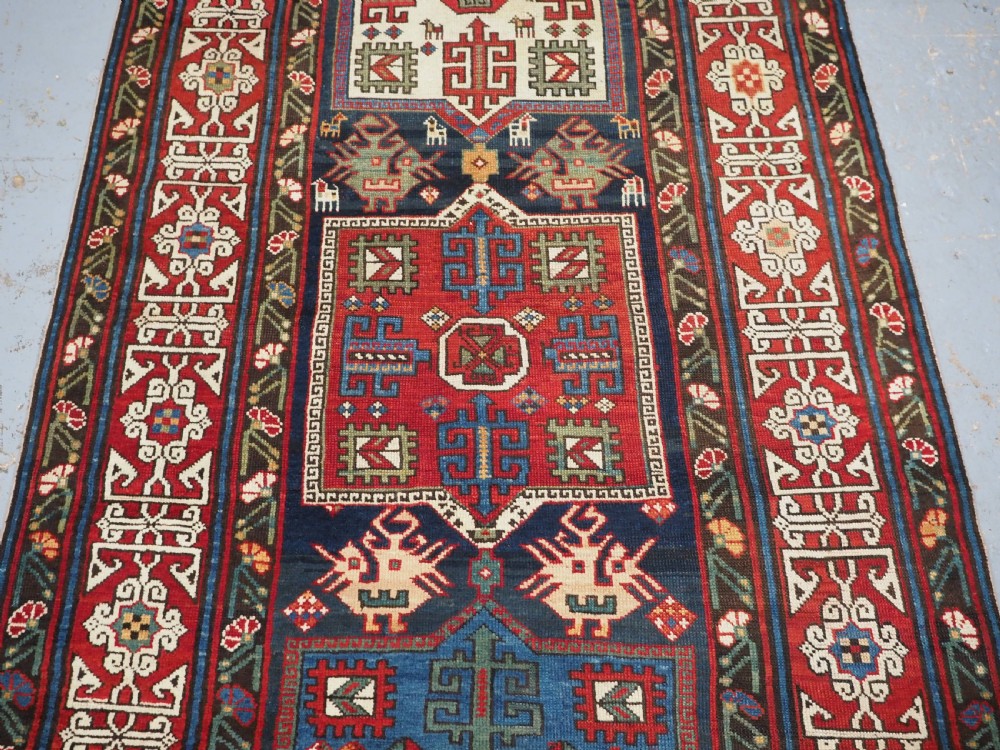 ANTIQUE CAUCASIAN SHIRVAN KUBA REGION LONG RUG, CIRCA 1890. View IV