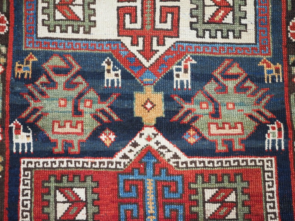 ANTIQUE CAUCASIAN SHIRVAN KUBA REGION LONG RUG, CIRCA 1890. View X