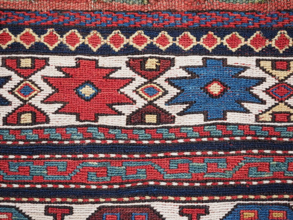 ANTIQUE SHAHSAVAN SADDLE BAG FACE IN SOUMAK TECHNIQUE, CIRCA 1880. View XI
