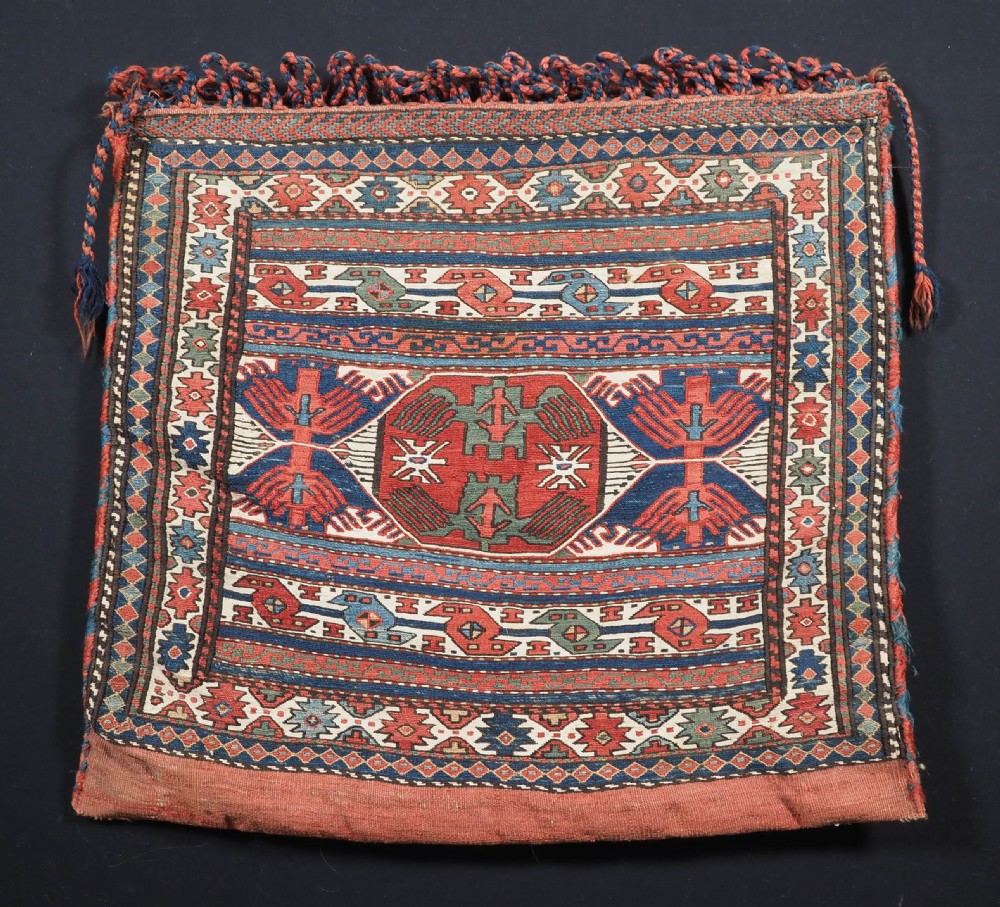 ANTIQUE SHAHSAVAN SADDLE BAG FACE IN SOUMAK TECHNIQUE, COMPLETE WITH BACK (a), CIRCA 1880.