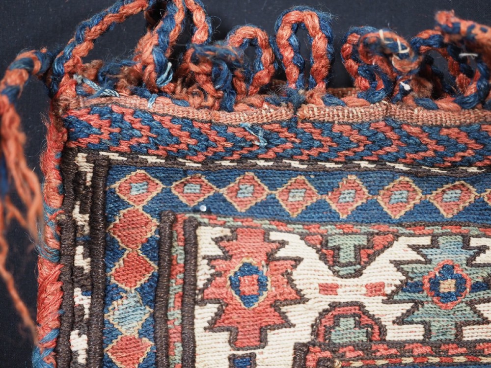 ANTIQUE SHAHSAVAN SADDLE BAG FACE IN SOUMAK TECHNIQUE, COMPLETE WITH BACK (b), CIRCA 1880. View IX
