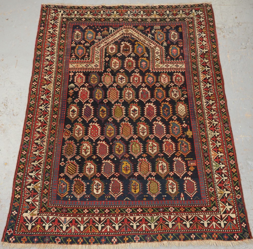 ANTIQUE CAUCASIAN BLACK MARASALI PRAYER RUG, SCARCE BORDER, CIRCA 1880.