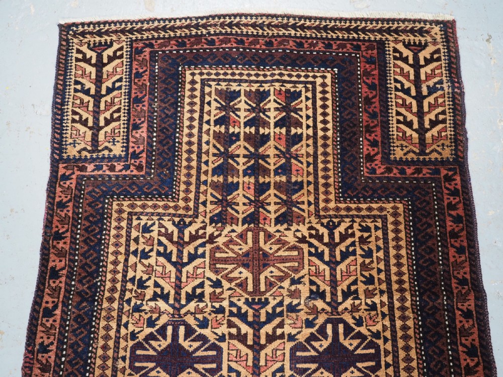ANTIQUE TIMURI BALUCH PRAYER RUG, CAMEL GROUND, CIRCA 1880. View III
