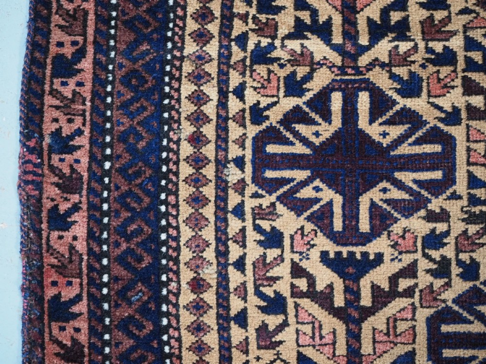 ANTIQUE TIMURI BALUCH PRAYER RUG, CAMEL GROUND, CIRCA 1880. View VI