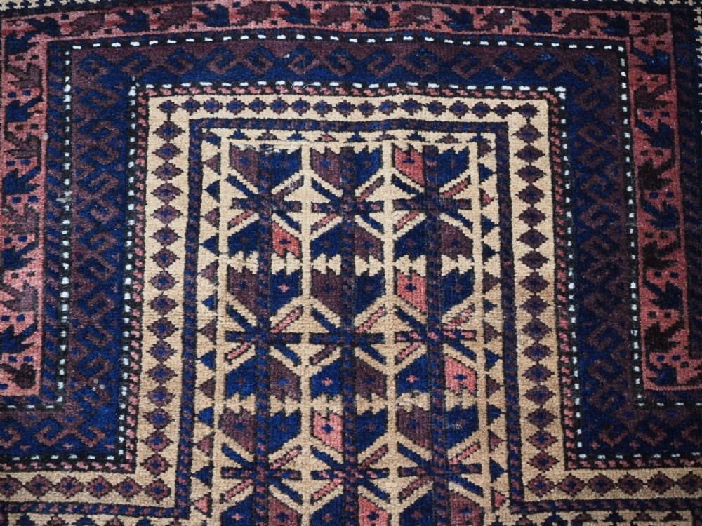 ANTIQUE TIMURI BALUCH PRAYER RUG, CAMEL GROUND, CIRCA 1880. View VII