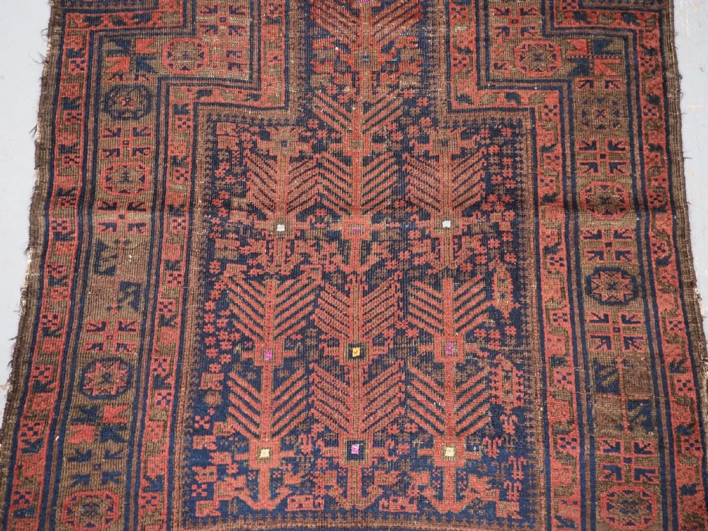 ANTIQUE TIMURI BALUCH PRAYER RUG WITH BLUE GROUND & SILK HIGHLIGHTS, CIRCA 1880. View IV