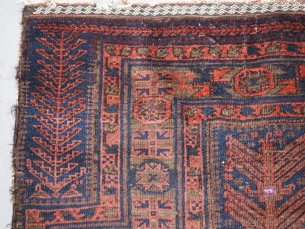 ANTIQUE TIMURI BALUCH PRAYER RUG WITH BLUE GROUND & SILK HIGHLIGHTS, CIRCA 1880. View VI
