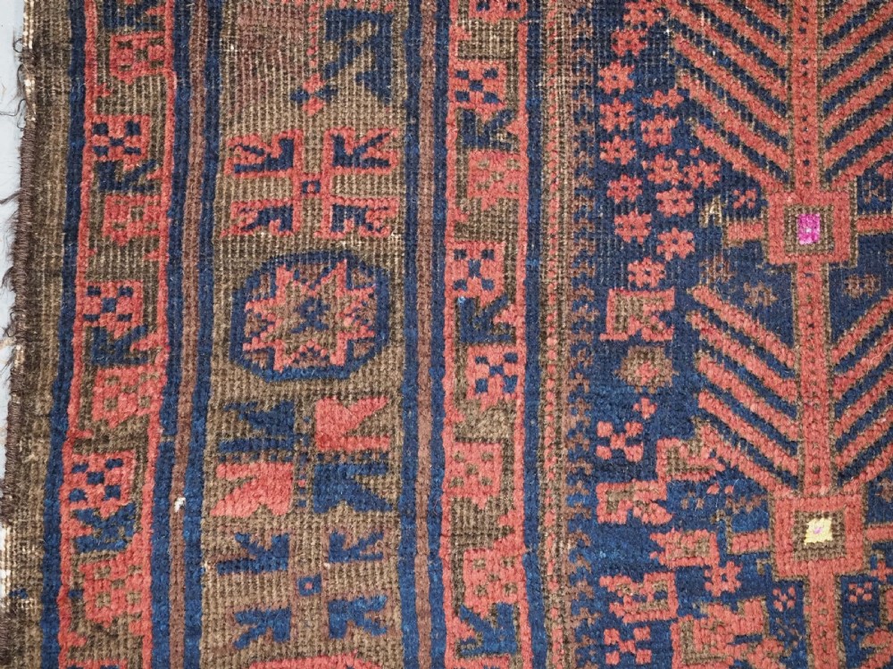 ANTIQUE TIMURI BALUCH PRAYER RUG WITH BLUE GROUND & SILK HIGHLIGHTS, CIRCA 1880. View VII