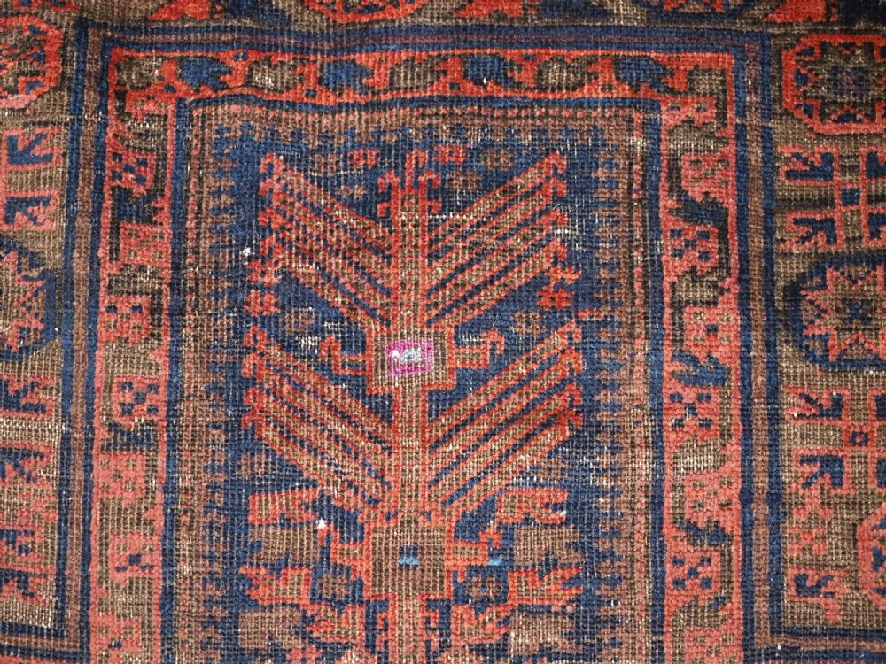 ANTIQUE TIMURI BALUCH PRAYER RUG WITH BLUE GROUND & SILK HIGHLIGHTS, CIRCA 1880. View VIII