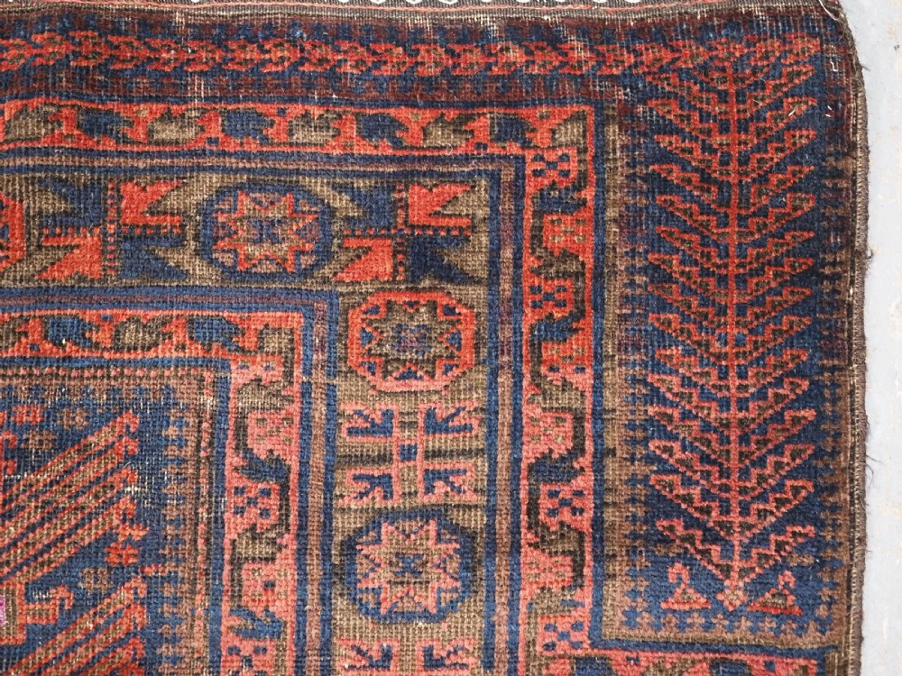 ANTIQUE TIMURI BALUCH PRAYER RUG WITH BLUE GROUND & SILK HIGHLIGHTS, CIRCA 1880. View IX