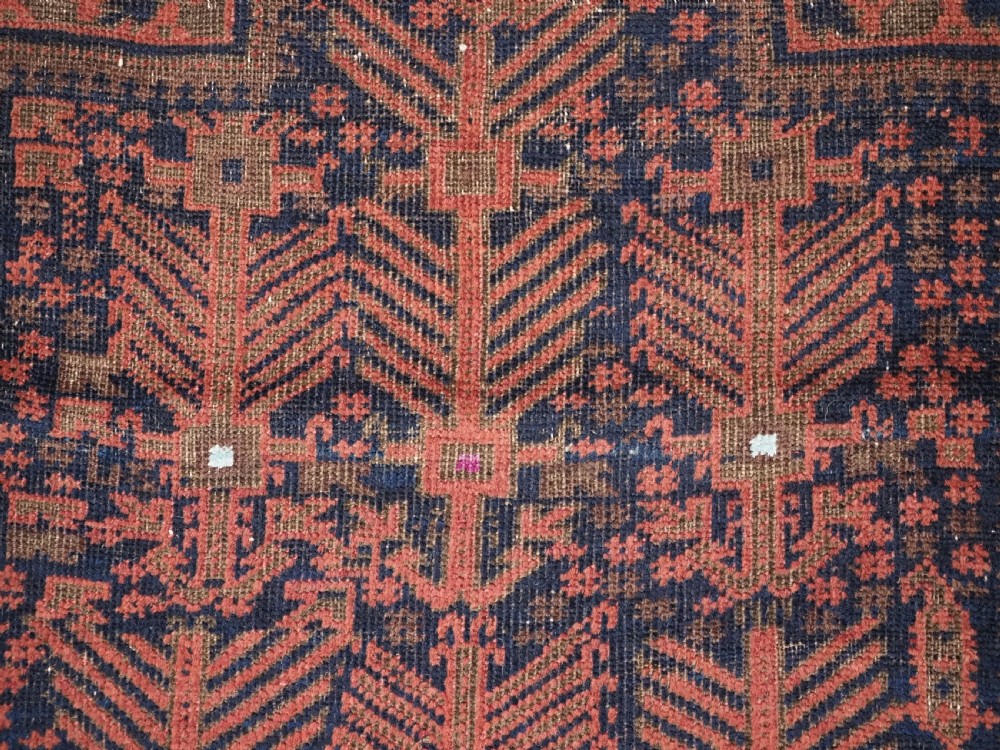 ANTIQUE TIMURI BALUCH PRAYER RUG WITH BLUE GROUND & SILK HIGHLIGHTS, CIRCA 1880. View X
