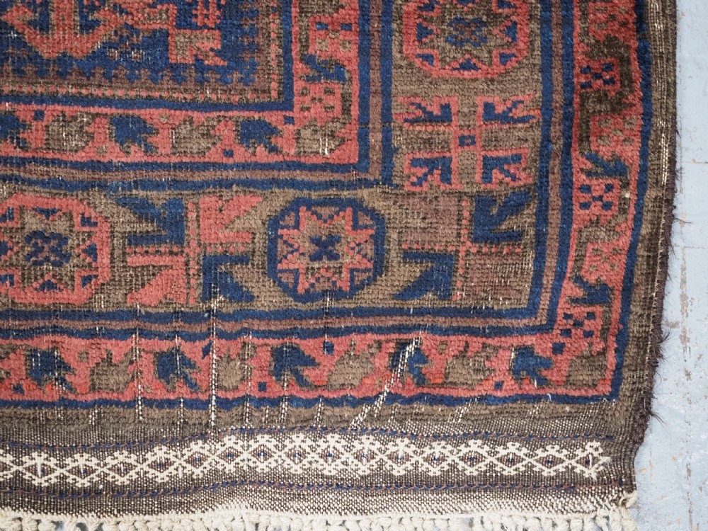 ANTIQUE TIMURI BALUCH PRAYER RUG WITH BLUE GROUND & SILK HIGHLIGHTS, CIRCA 1880. View XIII