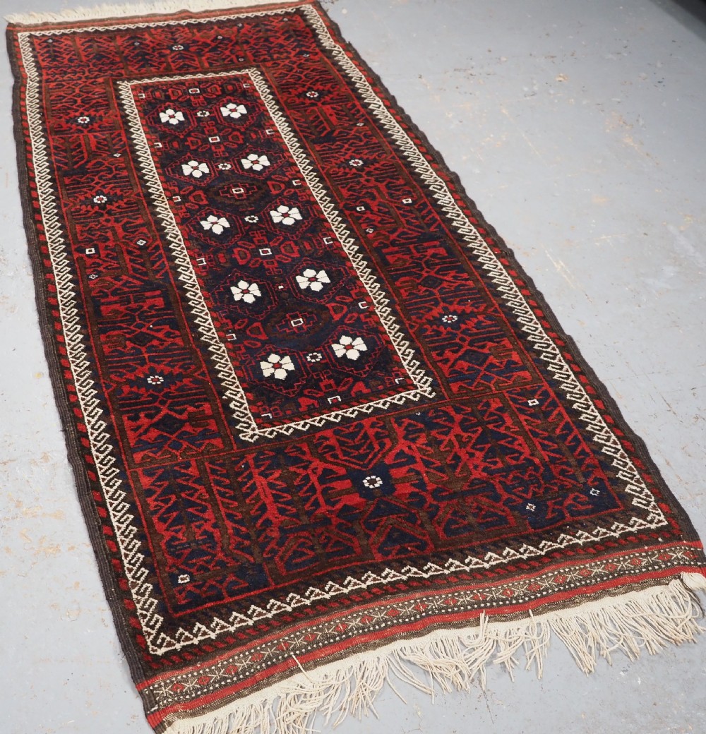 ANTIQUE BALUCH RUG WITH MINA KHANI DESIGN, CIRCA 1900. View II