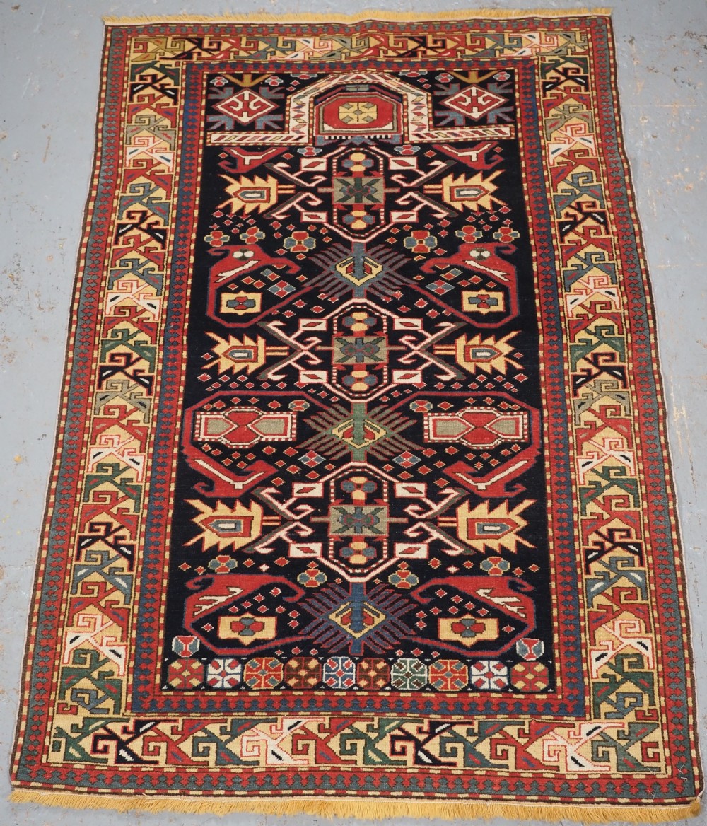 VINTAGE CAUCASIAN PRAYER RUG, KUBA DESIGN, CIRCA 1930.