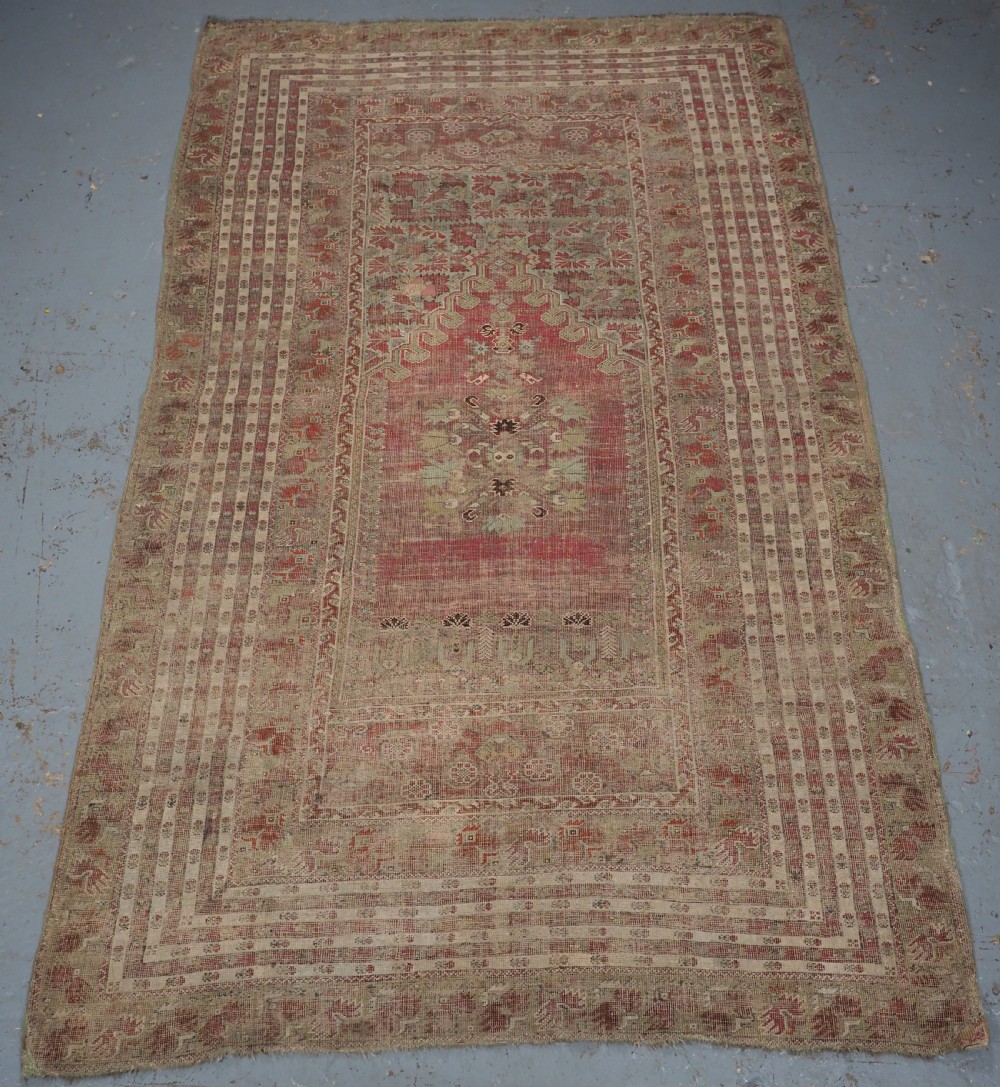 ANTIQUE TURKISH GHIORDES PRAYER RUG OF LARGE SIZE, PRE 1800. View III