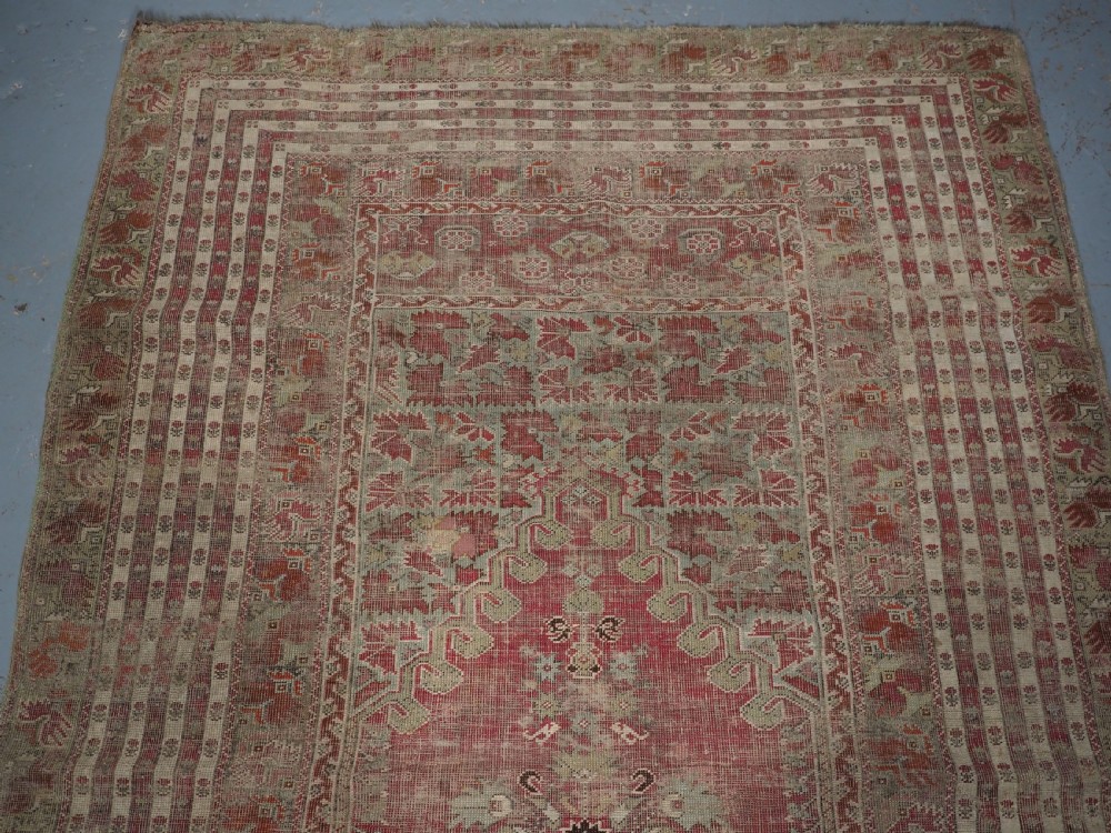 ANTIQUE TURKISH GHIORDES PRAYER RUG OF LARGE SIZE, PRE 1800. View IV